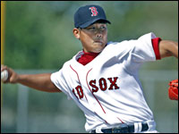 Daisuke Matsuzaka threw live batting practice for the first time dressed in the team's home white uniforms that they wore because it was 
