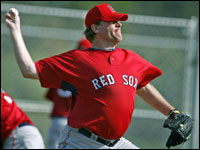 Red Sox pitcher Curt Schilling fires the ball to secondbase during a fielding drill at this mornings workout.  (Globe Staff Photo/ Jim Davis)