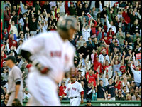 David Ortiz rounded first base as fans (in background) showed their appreciation of Ortiz's two-run home run. (Globe Staff Photo/ Barry Chin)
