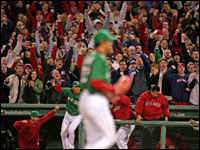 Red Sox pitcher Hideki Okajima shutting down Yankees in the 9th inning picking up a save as the fans go crazy at Fenway Park. (Globe Staff Photo/ Matthew J. Lee)