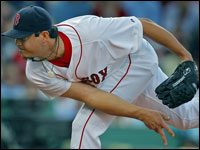  Red Sox starting pitcher Josh Beckett fires a scorching first-inning pitch against Cleveland. (Jim Davis/Globe Staff)