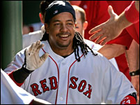  Manny Ramirez and teammates celebrate in the dugout after Manny's solo home run in the fourth inning on June 16th.  The homer proved to be enough as Boston defeated San Francisco 1-0.  - (Globe Staff Photo / Barry Chin)