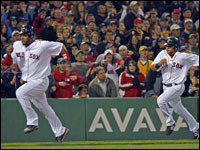  Wily Mo Pena (left) is almost lapped by the speedy Coco Crisp as they both head for the plate on Dustin Pedroia's fifth-inning bases-loaded double against the New York Yankees on June 3rd.  (Jim Davis/Globe Staff)