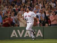  The Boston Red Sox's Kevin Youkilis runs down the third base line during his inside-the-park home run during seventh-inning action against the Cleveland Indians at Fenway Park on Monday, May 28, 2007.(Matthew J. Lee/Globe Staff Photo)