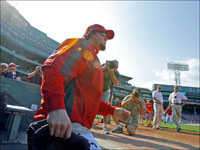   Boston reliever Eric Gagne comes out of the home dugout for the first time as a member of the Red Sox as he takes the field for batting practice. (Jim Davis/Globe Staff)