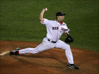   Red Sox ace Josh Beckett finishes off his shutout, pitching with two out in the ninth as he dominated the Angels 4-0 in Game 1 of the ALDS. (Stan Grossfeld/Globe Staff)