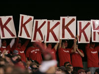   Fans hold up strikeout signs during Game 1 of the ALDS, in which Josh Beckett threw a shutout against the Los Angeles Angels of Anaheim. (Bill Greene/Globe Staff)