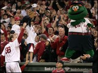   Curt Schilling tips his cap to a standing ovation as he leaves the field after the seventh.(Barry Chin/Globe Staff)