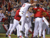   The Red Sox players mobbed each other on the field after defeating the Cleveland Indians to clinch a trip to the World Series.  (Jim Davis/Globe Staff)