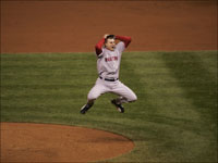   Red Sox closer Jonathan Papelbon soars above the mound with glee after striking out Seth Smith to end Game 4 of the World Series. (Bill Greene/Globe Staff)