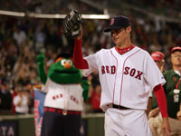   Clay Buchholz waved to the Fenway crowd following his historic performance. (David Kamerman/Globe Staff)