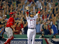   Manny Ramirez stood and admired his game-winning home run in Game 2 of the ALDS against the Angels. (Jim Davis/Globe Staff)