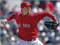 Ace Josh Beckett unleashes a fastball against Boston College. (Jim Davis/Globe Staff)