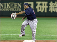 Manny being...Pedroia?  It looks like Manny Ramirez is trying out his skills at second base.  (Seriously, though, he'll play left field.) (Barry Chin/Globe Staff)