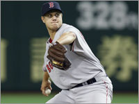 Jonathan Papelbon fires a fastball towards home plate in Japan. (Barry Chin/Globe Staff)