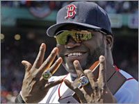 It's hard to tell what's brighter, David Ortiz's World Series rings or his smile.