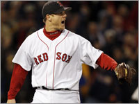 Jonathan Papelbon roars his approval after Dustin Pedroia made a sensational diving play to save a run in the ninth inning against the Toronto Blue Jays.