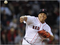Red Sox starting pitcher Bartolo Colon throws to first base during the third inning.