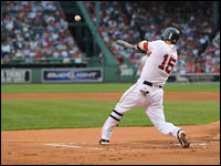 Red Sox second baseman Dustin Pedroia tees off against the Texas Rangers.