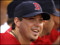 Red Sox hurler Josh Beckett is all smiles in the dugout during a game against the Chicago White Sox.