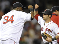 The meat of the Red Sox lineup -- David Ortiz and Dustin Pedroia -- congratulate each other after a win over the Orioles.