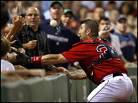 Red Sox Jason Varitek can't come up with this ball off the bat of Chicago's A.J. Pierzynski.
