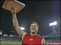 After the Red Sox clinched a playoff spot with a win against the Cleveland Indians, Jonathan Papelbon tore the third base bag from the ground and handed it to a fan.