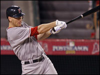 Jason Bay follows through on his two-run homer that put the Sox ahead, 2-1, in Game 1 of the ALDS against the Angels.