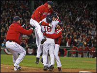 Sox players, including Game 4 starter Jon Lester (top), celebrate the team's ALDS win over the Angels.