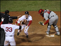 Jason Bay jumps up after scoring the winning run in Game 4 of the ALDS against the Angels at Fenway.