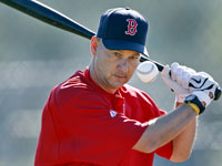 Manager Terry Francona keeps his eye on the (rubber) ball as he hits hard shots at one of his pitchers during a comebacker drill. (Jim Davis/Globe Staff)