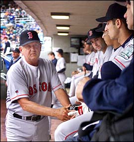 Jimy Williams greets his players