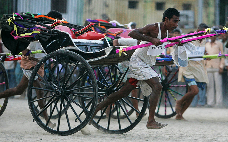 LOOKS FROM INDIA RICKSHAW PULLERS OF KOLKATA