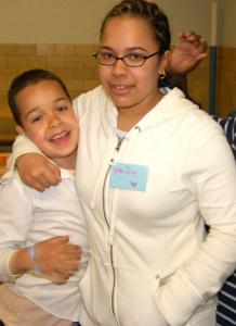 Yasmine Burgos (right), 13, and Dennis Burgos Jr., 10, were found dead Sunday in their Roslindale apartment. Teachers described Yasmine as devoted to her younger brother.