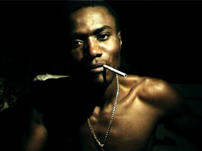 The film follows 2pac (above) and other leaders of armed gangs from the Cité Soleil slum hired by the president for protection.