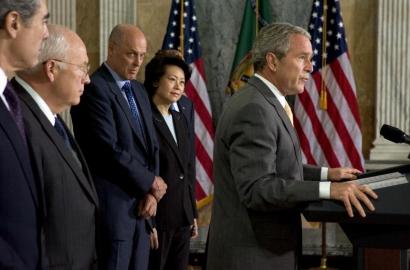 President Bush appeared with Vice President Dick Cheney (second from left) and other top officials to stress that he thinks the economy is sound.