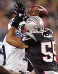 Seeing his first action since breaking his right arm last season, Junior Seau sacked the Titans' Vince Young Friday night.
