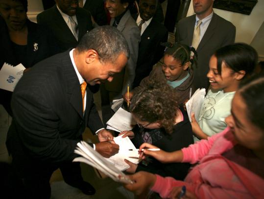 Sixth-graders from Malden sought Governor Deval Patrick's autograph yesterday. 'I think people - all people, black people maybe in particular - want to know that I care,' he said.