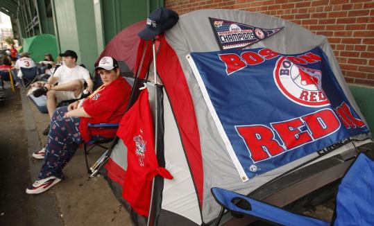 Red Sox fans camped outside Fenway Park yesterday waiting for tickets to the World Series, which begins tonight at Fenway Park when Boston takes on Colorado in Game 1. It is the second time in three years that the Sox have played in the Series.