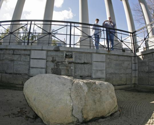Tourists from Kansas City, Mo., who declined to give their names snapped a photo of Plymouth Rock last week.