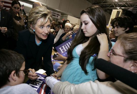 Democratic presidential hopeful Senator Hillary Clinton signed autographs while campaigning Monday in Brentwood, N.H., a state where she has some important advantages, including a history of campaigning for her husband.