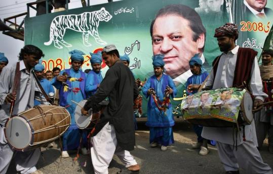 Folk dancers performed during an election rally yesterday for former Pakistan prime minister Nawaz Sharif in Vehari. Pakistan's Election Commission has upheld an election ban on Sharif.