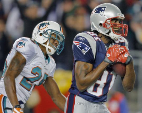 Will Allen is a frustrated Dolphin after Randy Moss's second TD.