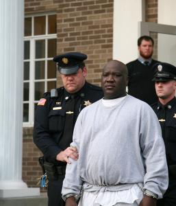 Christopher McCowen was led from Barnstable Superior Courthouse yesterday after a hearing on whether there was racial bias on the part of some jurors during his 2006 murder trial.