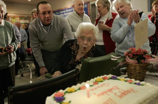Wit on display, Irene Davey had Kevin Dumas, mayor of Attleboro, by her side as she celeberated 100 years of living yesterday at the town's senior center.