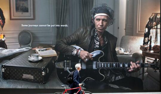 Keith Richards' billboard for Louis Vuitton luggage. The tagline for the ad is 'Some journeys cannot be put into words.'