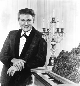 Liberace (above in 1963) died in 1987, but his foundation is now marketing the pianist as the originator of ostentation.