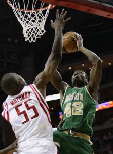 The Celtics' Tony Allen has a rather large roadblock in the form of the Rockets' Dikembe Mutombo on this first-quarter attempt.