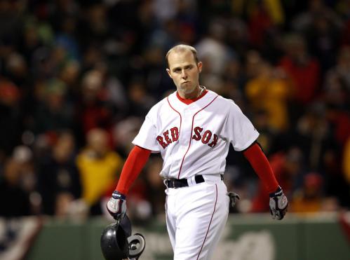 Red Sox second baseman Dustin Pedroia walked back to the dugout after lining out to left field to end the game.