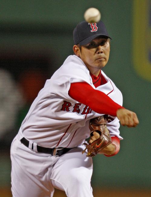 Daisuke Matsuzaka delivers a pitch against the New York Yankees.
